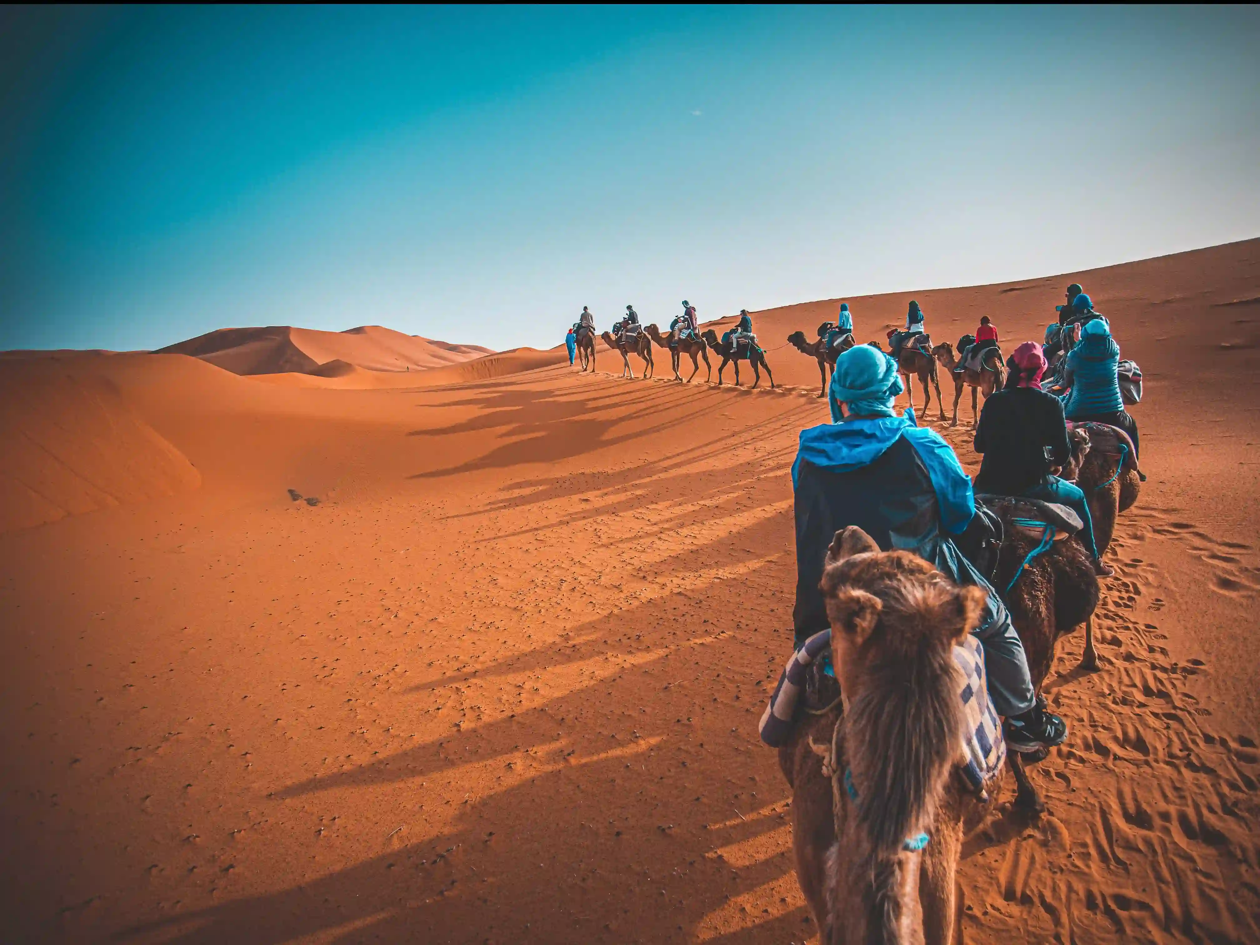 Discover the vast Sahara Desert in Morocco, with golden sand dunes, camel treks, and unforgettable desert camping experiences
